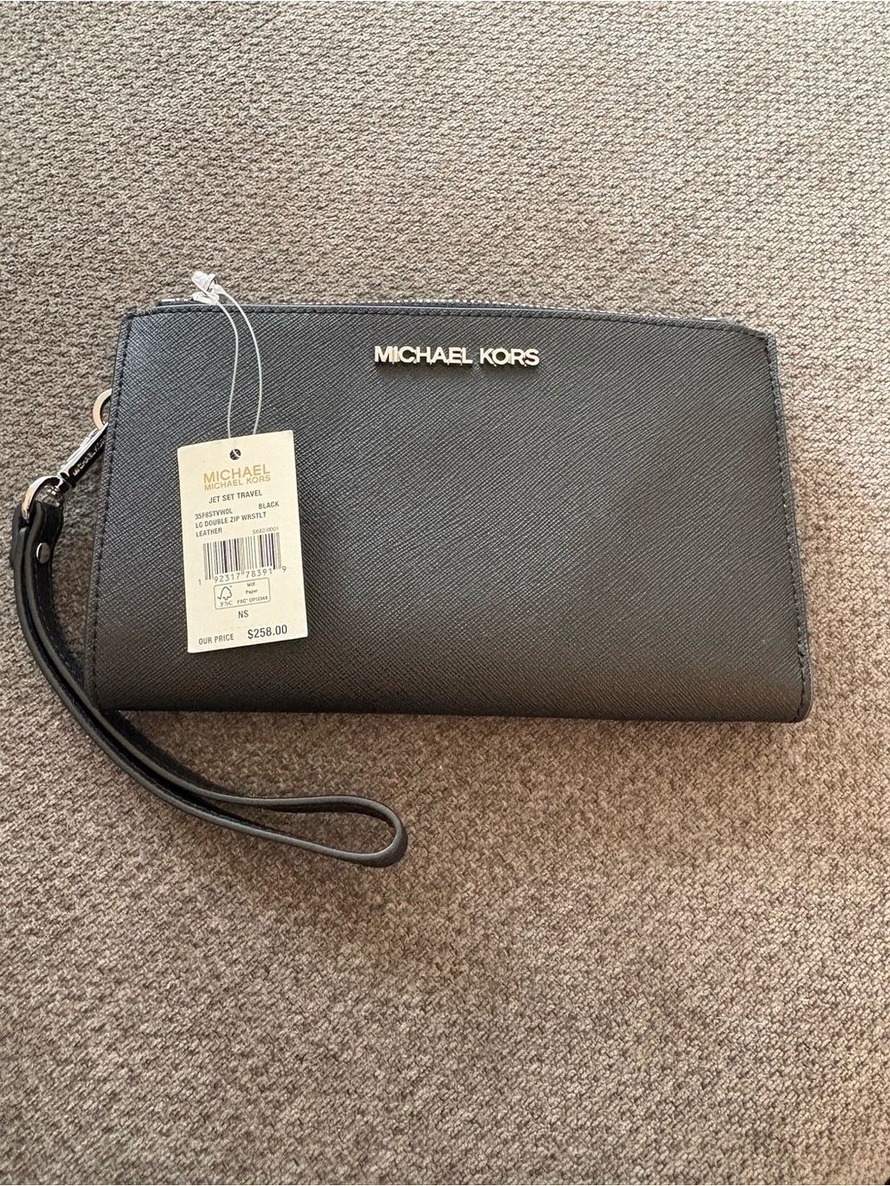 Michael Kors Black Saffiano Wristlet Wallet with Silver Logo